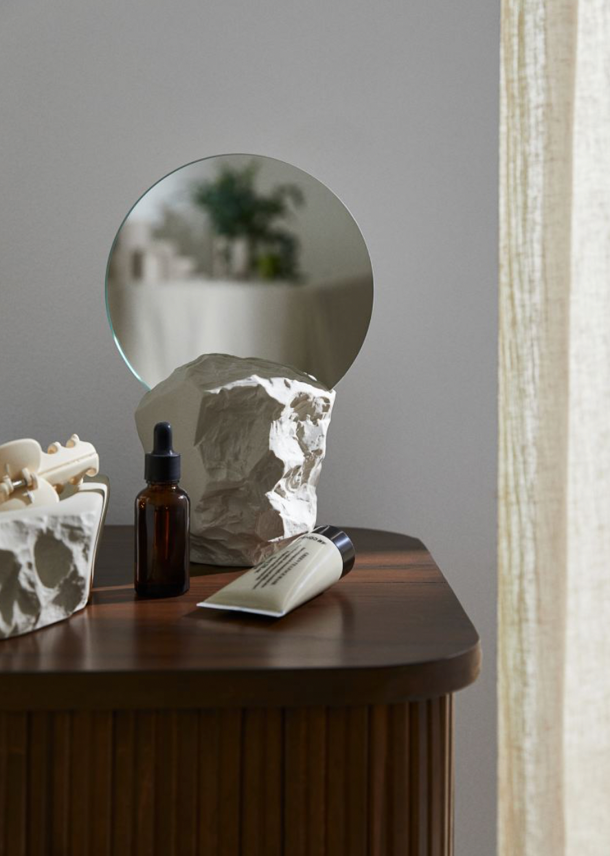 Small stoneware-based mirror