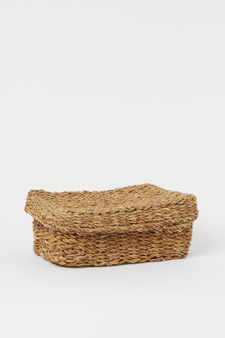 Lidded storage basket