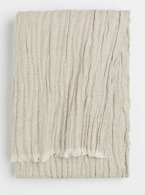Crinkled linen-blend blanket