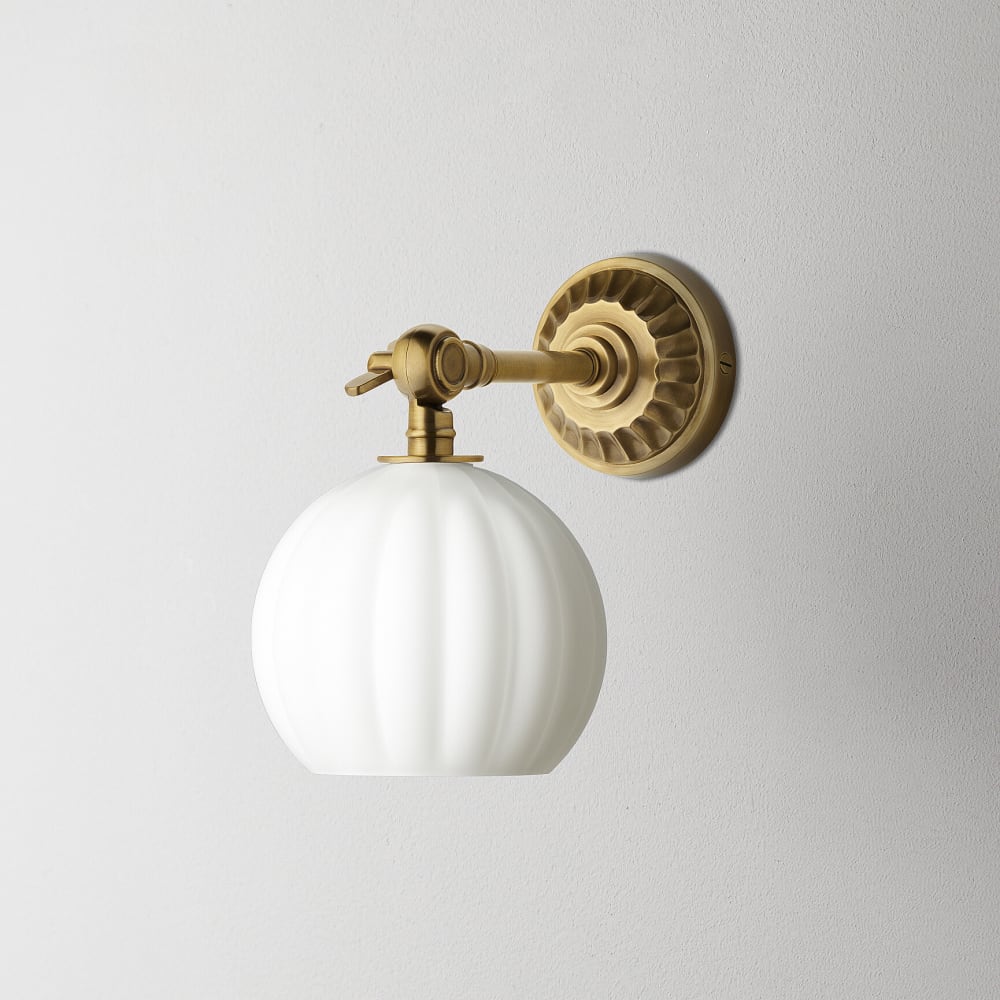 Rose wall fitting IP44 rated in antique brass