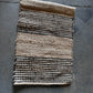 Nkuku Patuli Natural Fabric Wall Art Hanging in Natural and Black Jute Woven Design