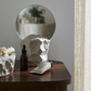 Small stoneware-based mirror
