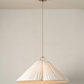 Lindi - aged brass and linen oversized scalloped pendant