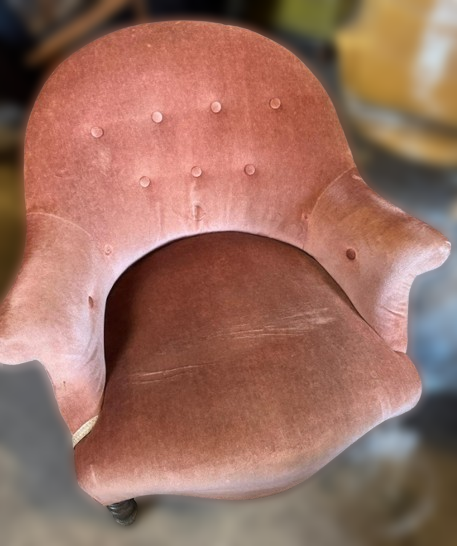 Pink buttoned back armchair