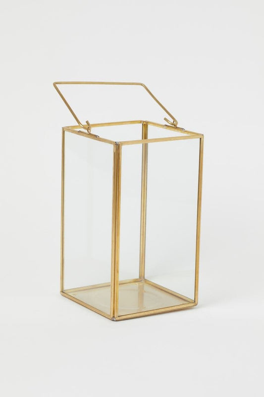Metal pillar candle holder