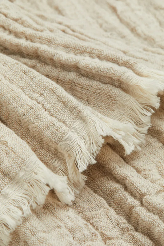 Crinkled linen-blend blanket