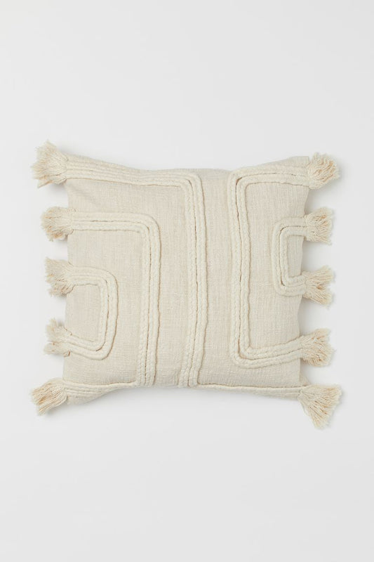Tasselled cushion cover